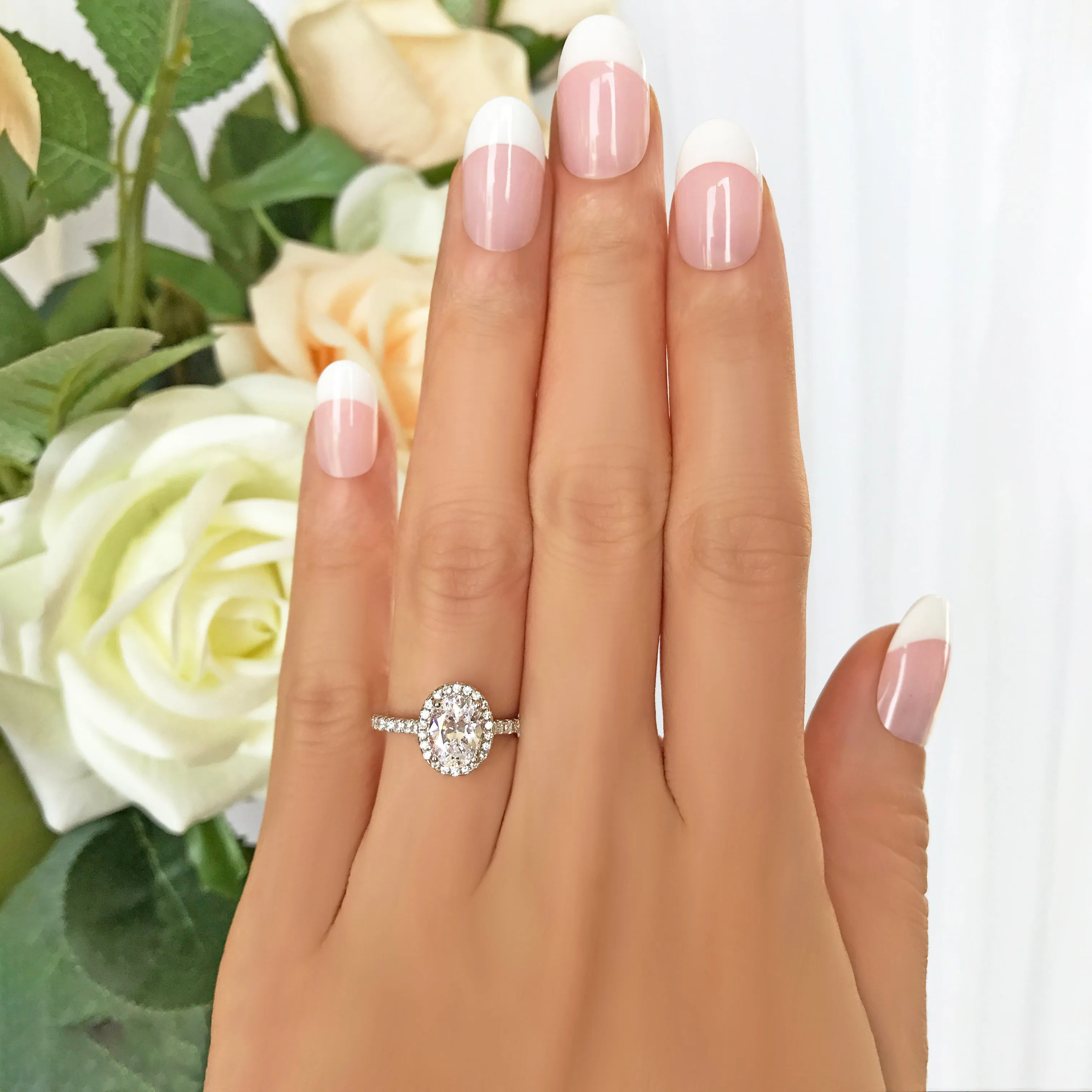 1.5 ctw Oval Halo Ring